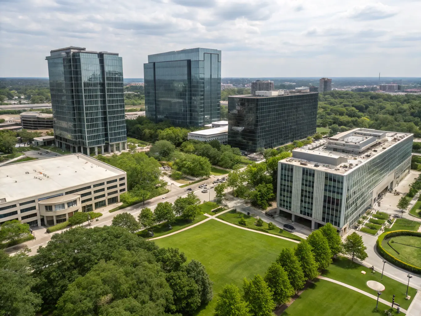 An image showcasing modern commercial and residential buildings developed by Astro AMC, highlighting their quality and design.
